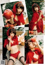 A woman in a red dress holding an apple.